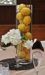 lemons in a vade nonfloral centerpiece