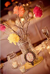 painted branch centerpiece with paper flowers